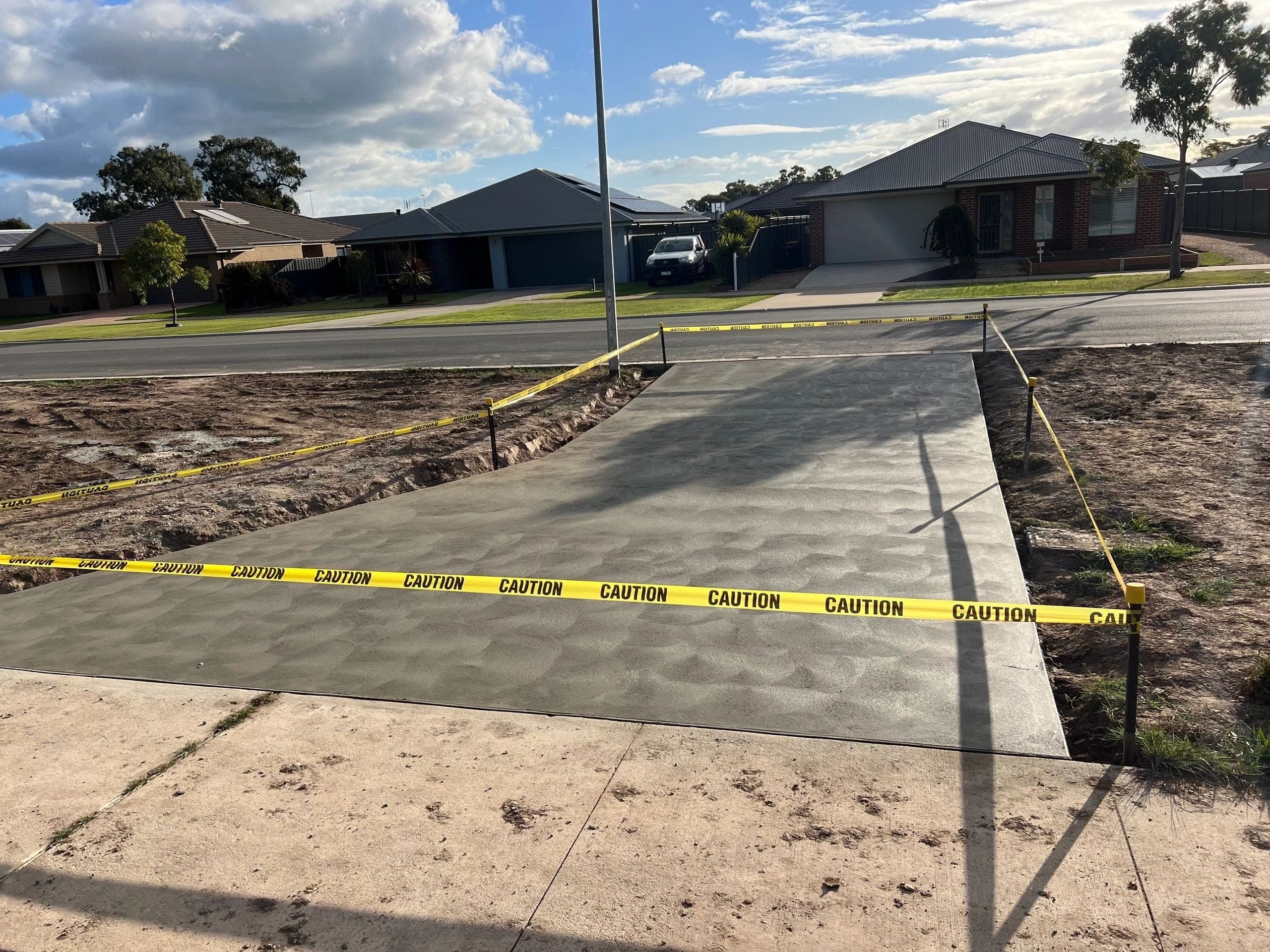 Plain concrete crossover · Stratford · TMT Concreting & Maintenance