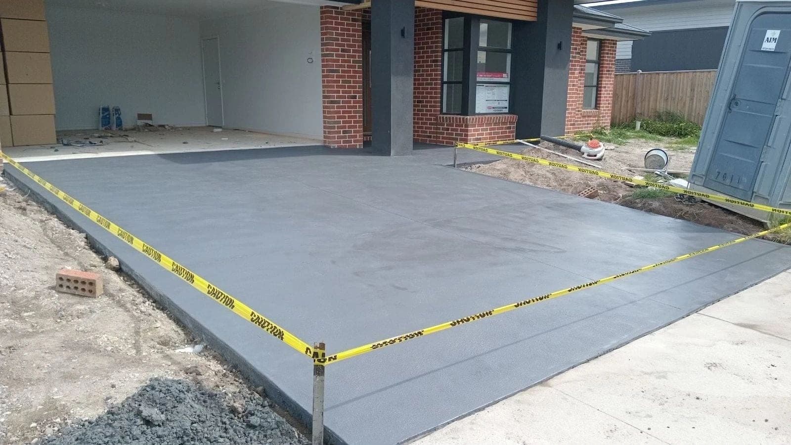 New coloured concrete driveway · Gippsland · TMT Concreting & Maintenance