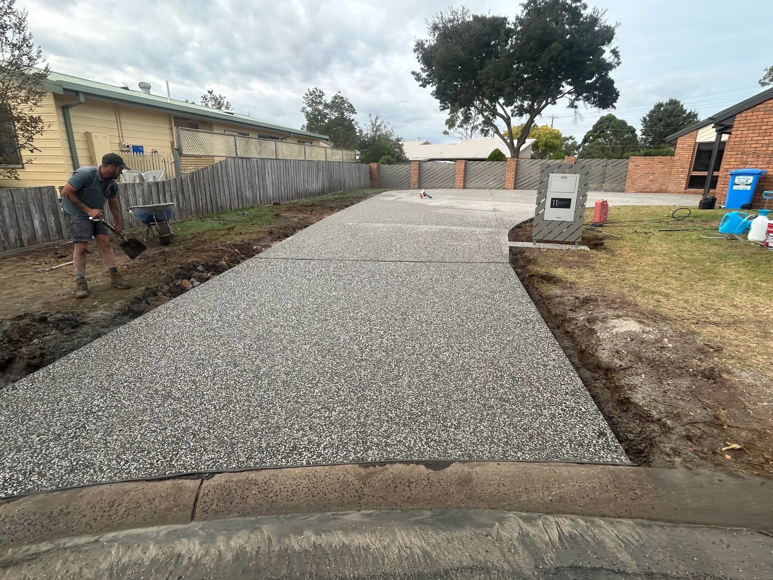 Exposed aggregate concrete driveway · Gippsland — TMT Concreting & Maintenance