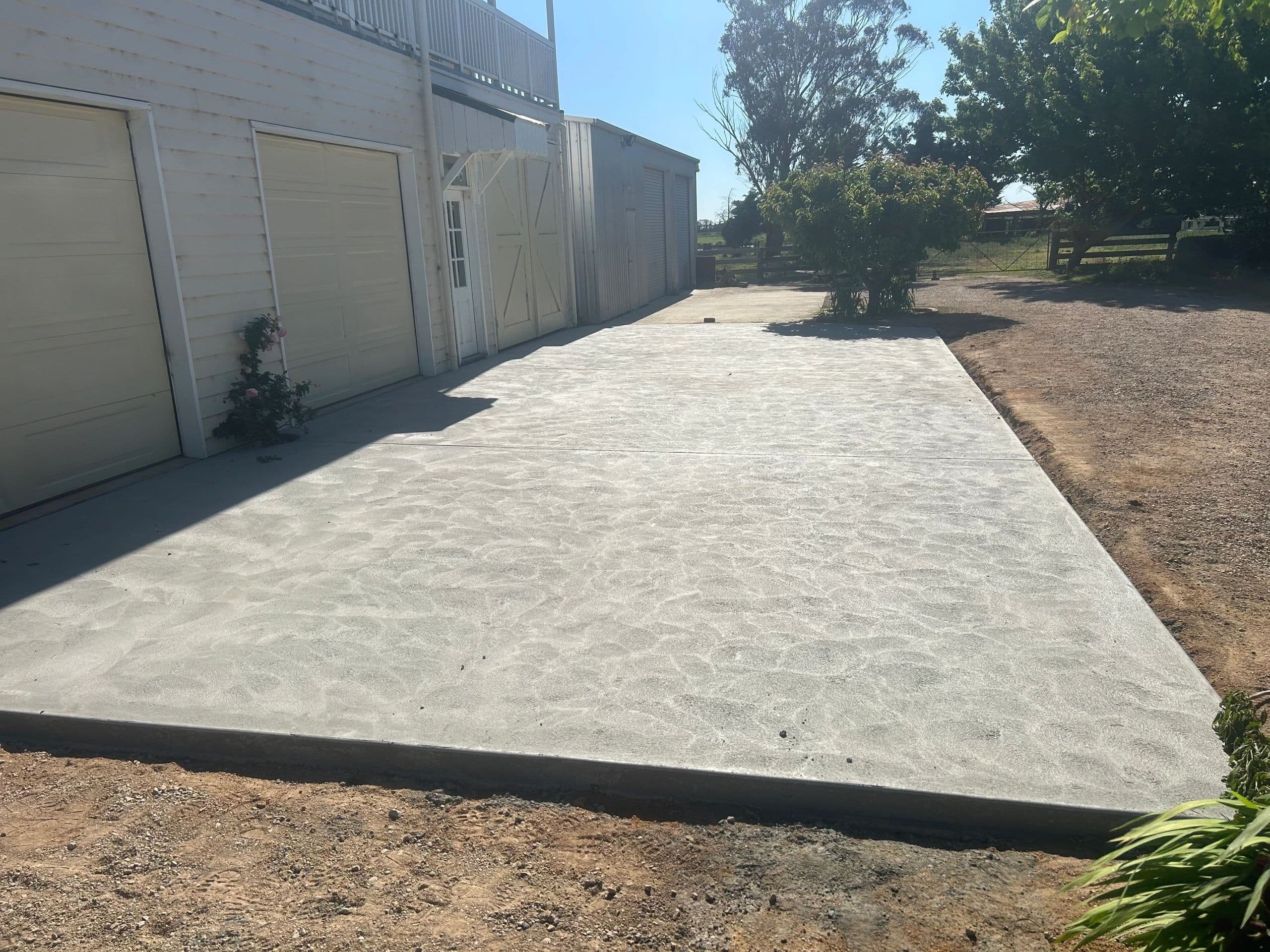 Concrete apron with plain non-slip finish · Gippsland — TMT Concreting & Maintenance