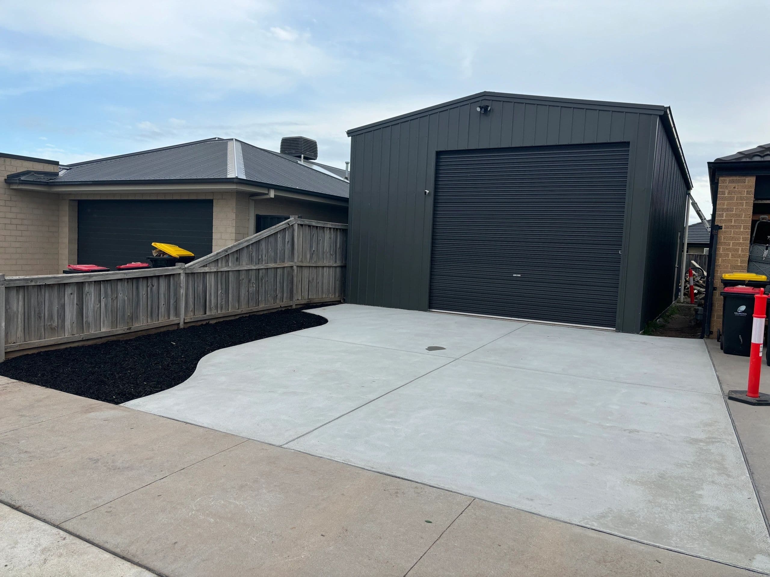 Concrete shed apron with plain non-slip finish · Gippsland — TMT Concreting & Maintenance