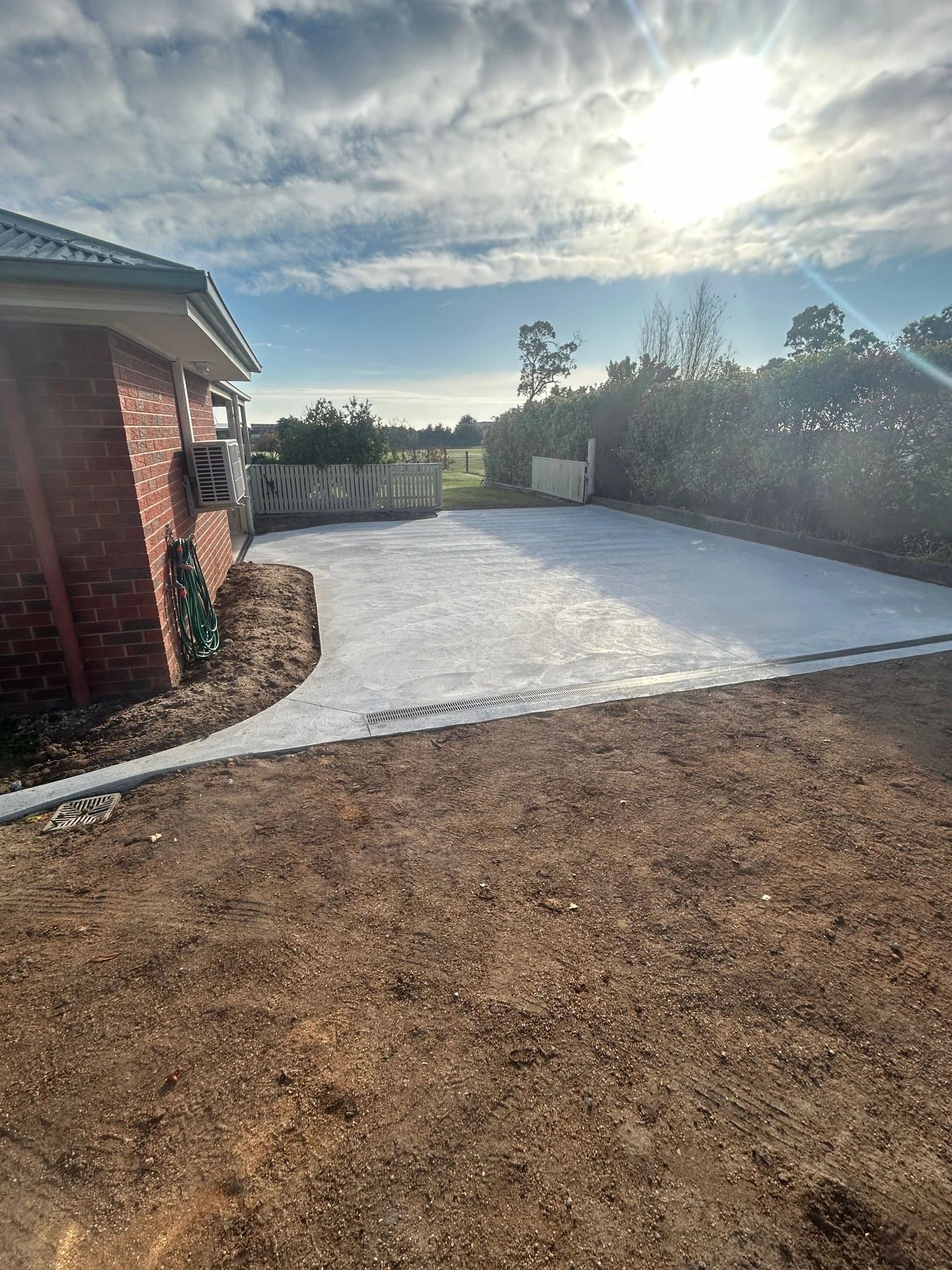 Concrete house apron · Gippsland — TMT Concreting & Maintenance
