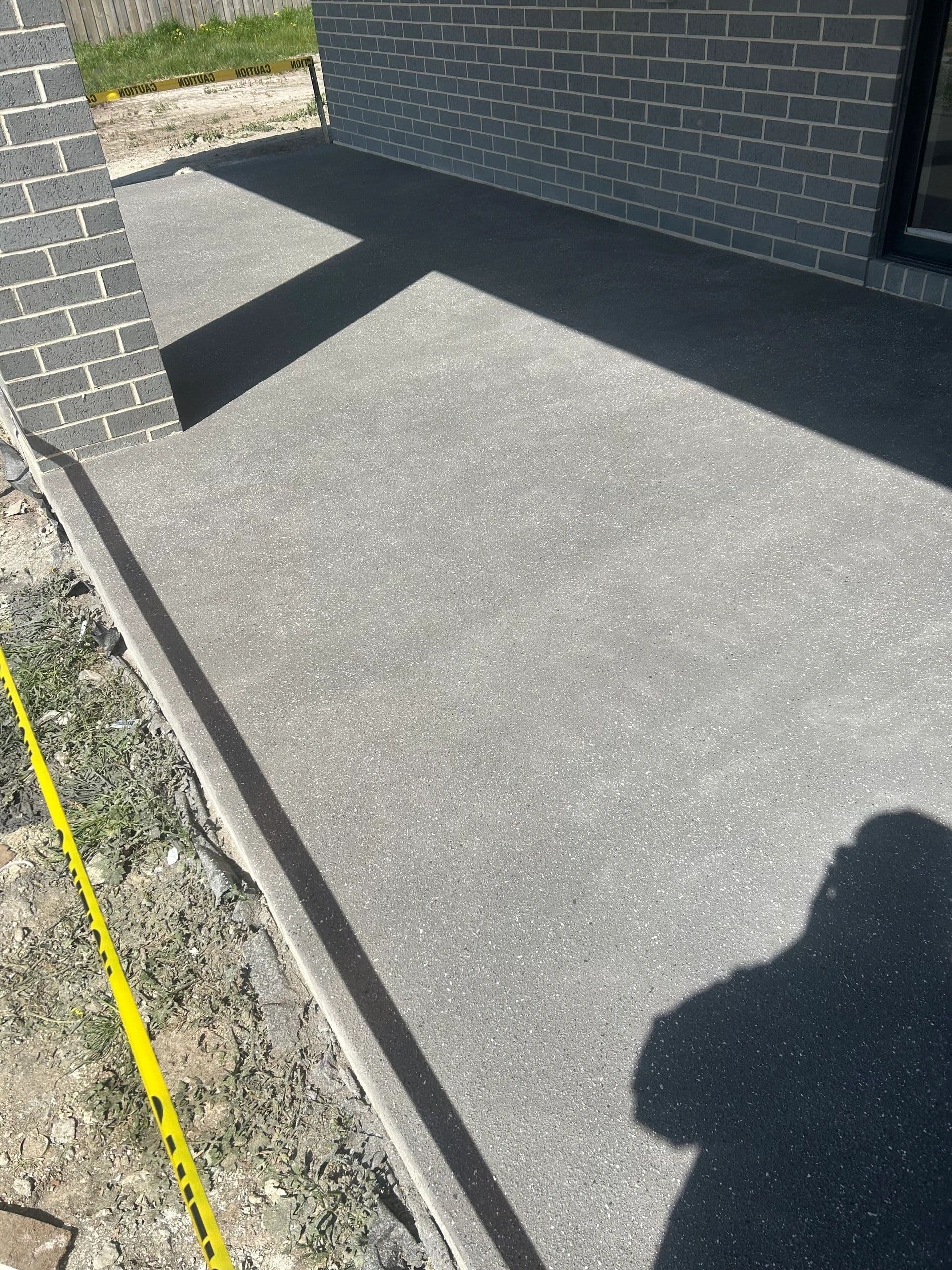 Spray pave concrete surround · Gippsland — TMT Concreting & Maintenance