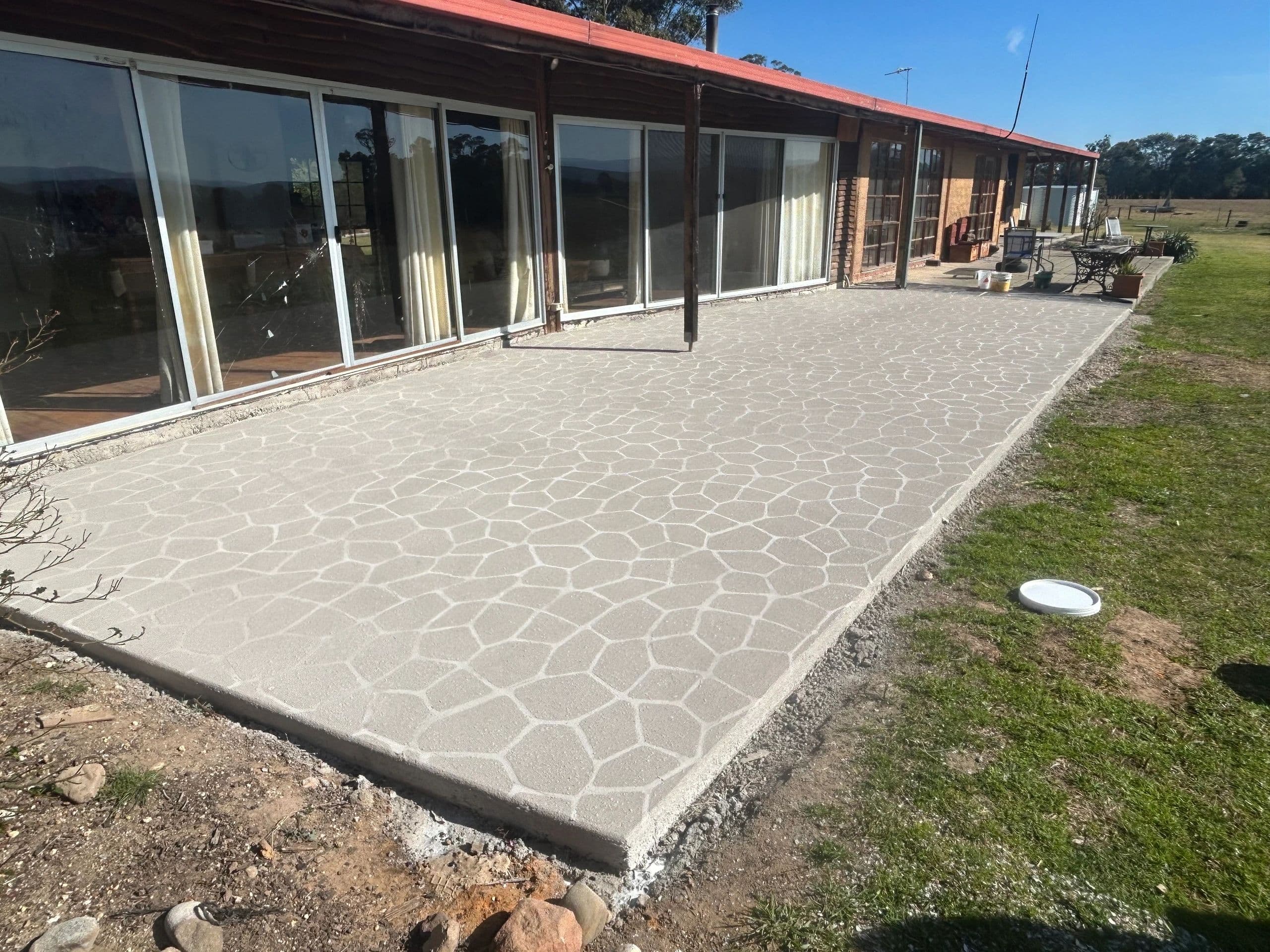 Stencil spray pave pattern · Gippsland — TMT Concreting & Maintenance